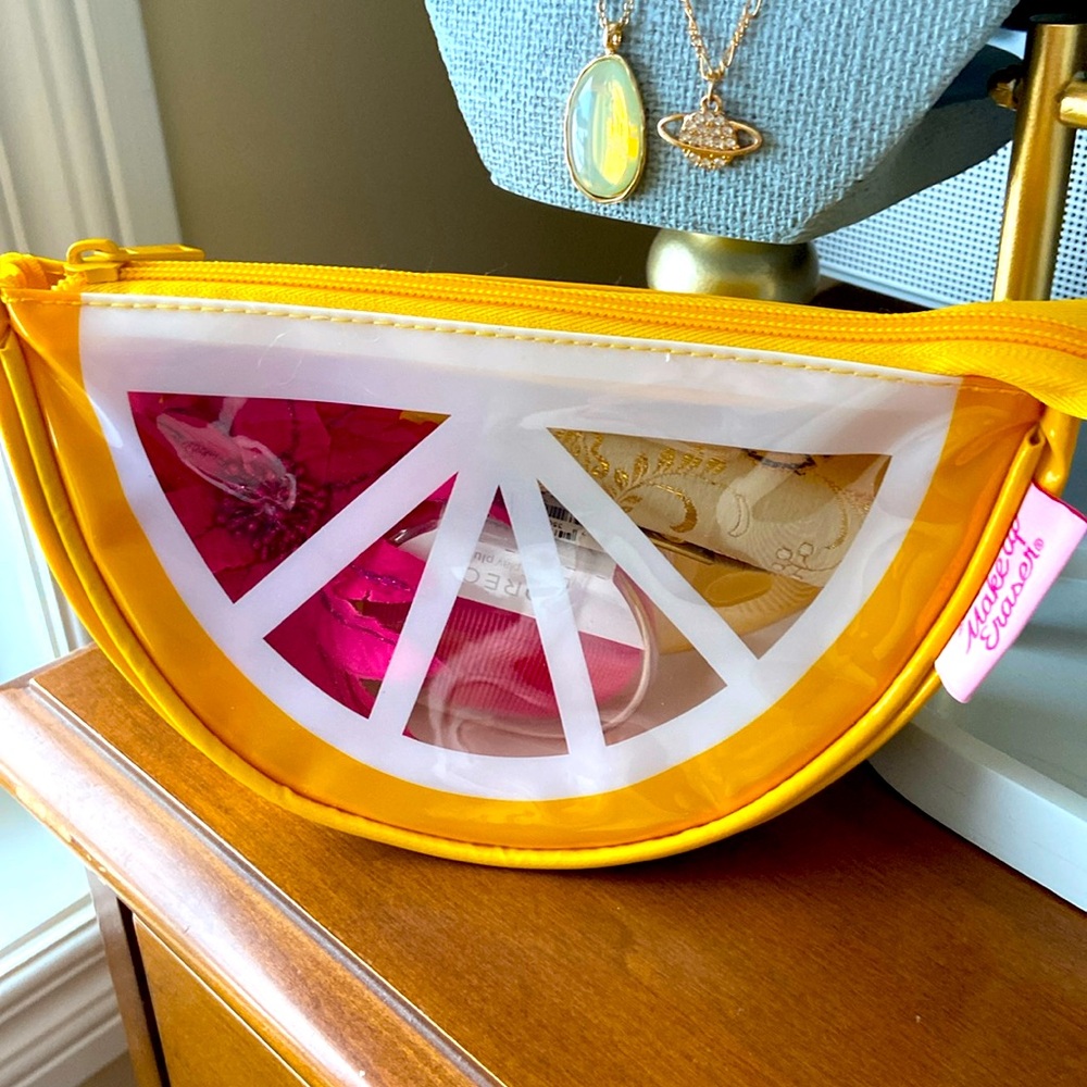 NWOT Makeup Eraser plastic cosmetic purse